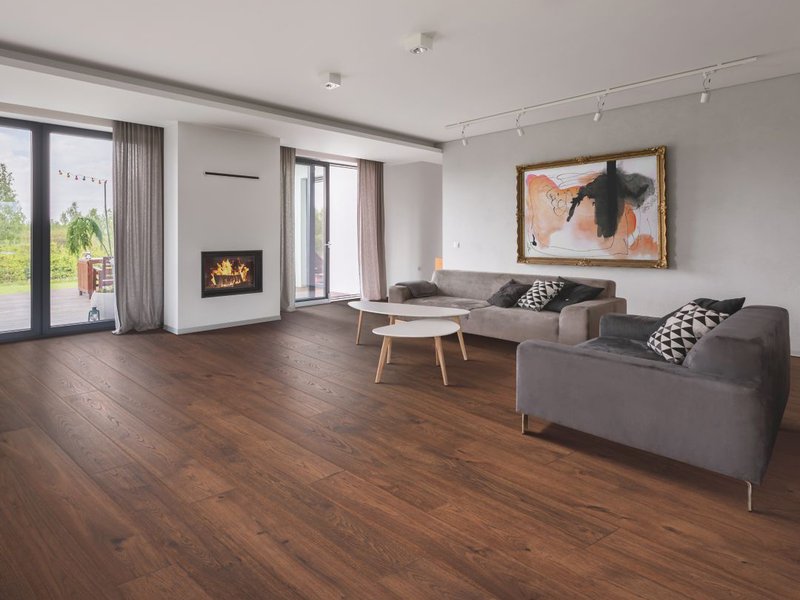 Hardwood flooring extending from the living room to the kitchen