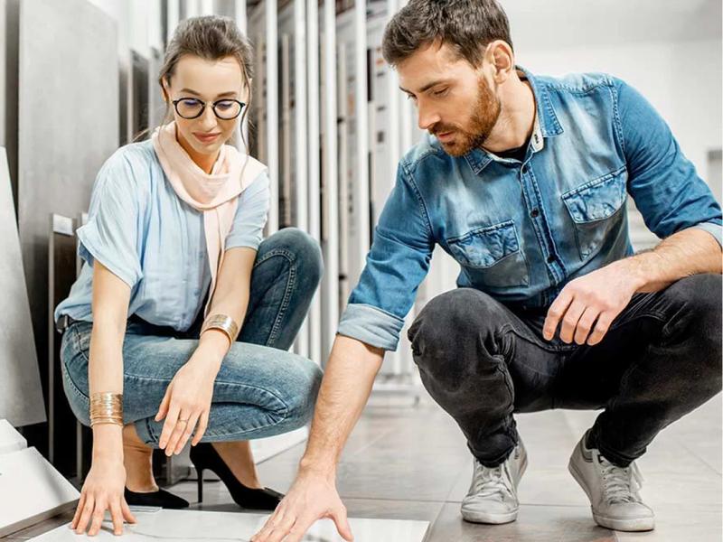 Couple selecting flooring